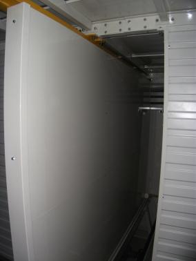 Leaded sliding partition for a decay tank.